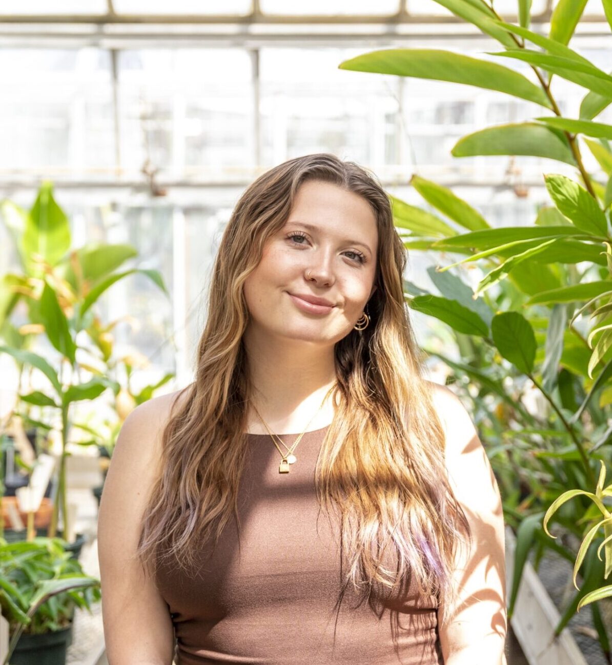 Image of Jailyn Murphy in a greenhouse